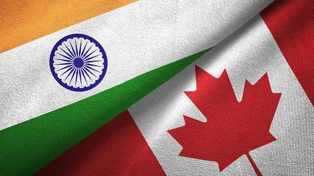 <div class="paragraphs"><p>The flags of India and Canada.</p><p>Image for representation.</p></div>