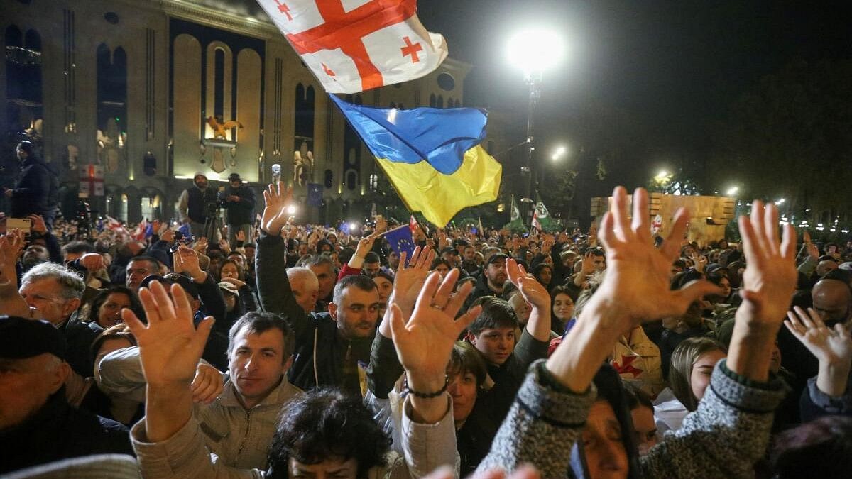 <div class="paragraphs"><p>Protesters gather outside Georgian parliament after disputed election</p></div>