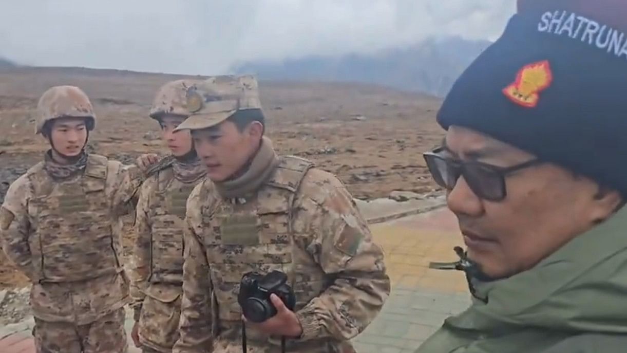 <div class="paragraphs"><p>Screengrab from a video showing Union minister Kiren Rijiju interacting with Chinese soldiers, November 1, 2024.</p></div>