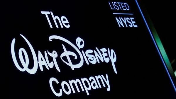 <div class="paragraphs"><p>A screen shows the logo and a ticker symbol for The Walt Disney Company.</p></div>