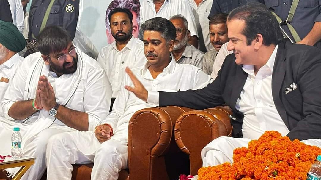 <div class="paragraphs"><p>Abdul Rehman Khan Kanju (right) during his visit to Chautala village.&nbsp;</p></div>