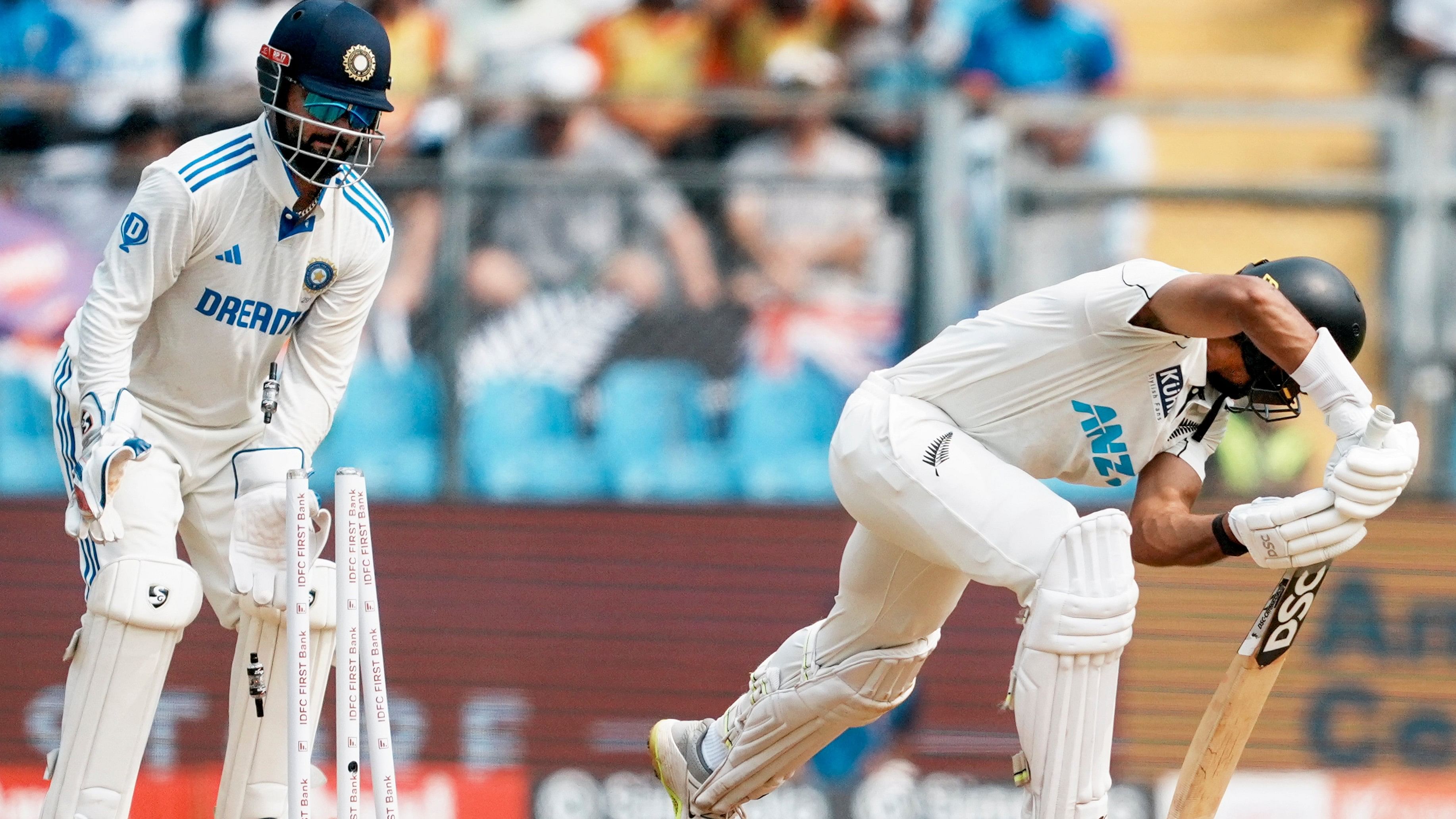 <div class="paragraphs"><p>New Zealand's batter Rachin Ravindra being bowled out by India's bowler Washington Sundar (not seen) during the first day of the third Test cricket match between India and New Zealand, at Wankhede Stadium.</p></div>