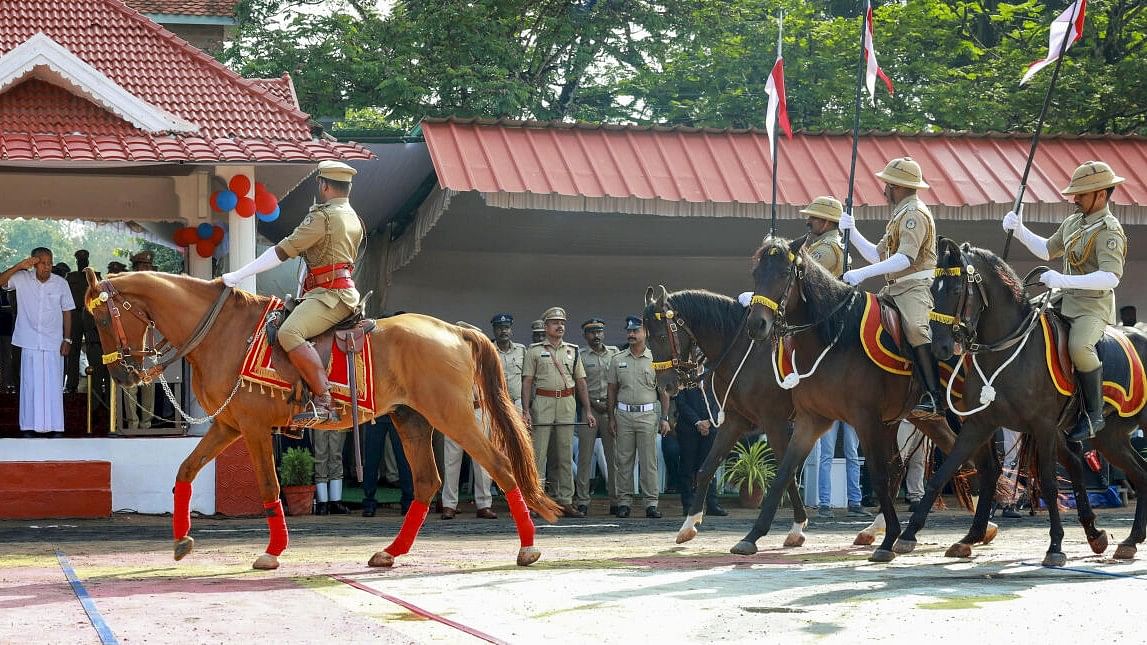 <div class="paragraphs"><p>Kerala Chief Minister Pinarayi Vijayan takes the salute during the Passing Out Parade on the occasion of Kerala Formation Day, in Thiruvananthapuram.</p></div>