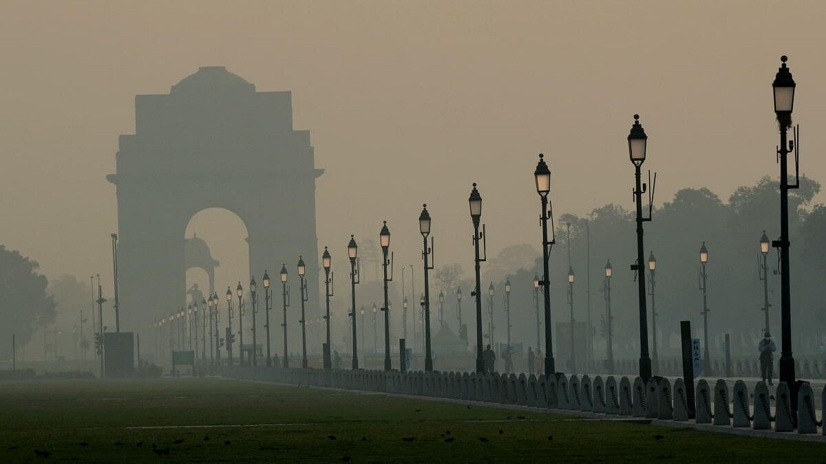 <div class="paragraphs"><p>India Gate engulfed in a layer of smog, a day after Diwali festival celebrations, in New Delhi, early Friday morning, Nov. 1, 2024.</p></div>