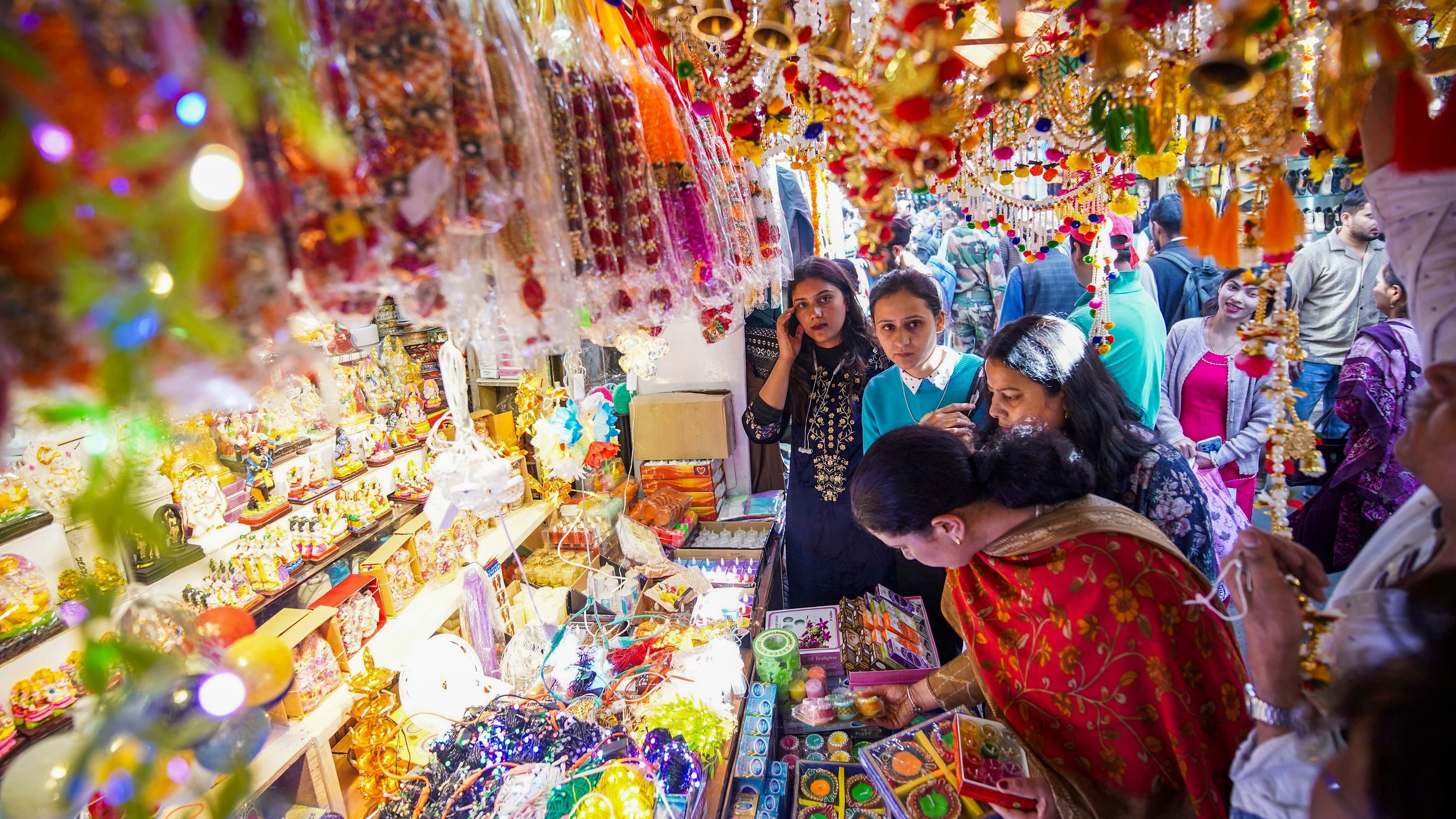 <div class="paragraphs"><p>Women buy decorative item ahead of Diwali festival, in Shimla, Tuesday, October 29, 2024. </p></div>