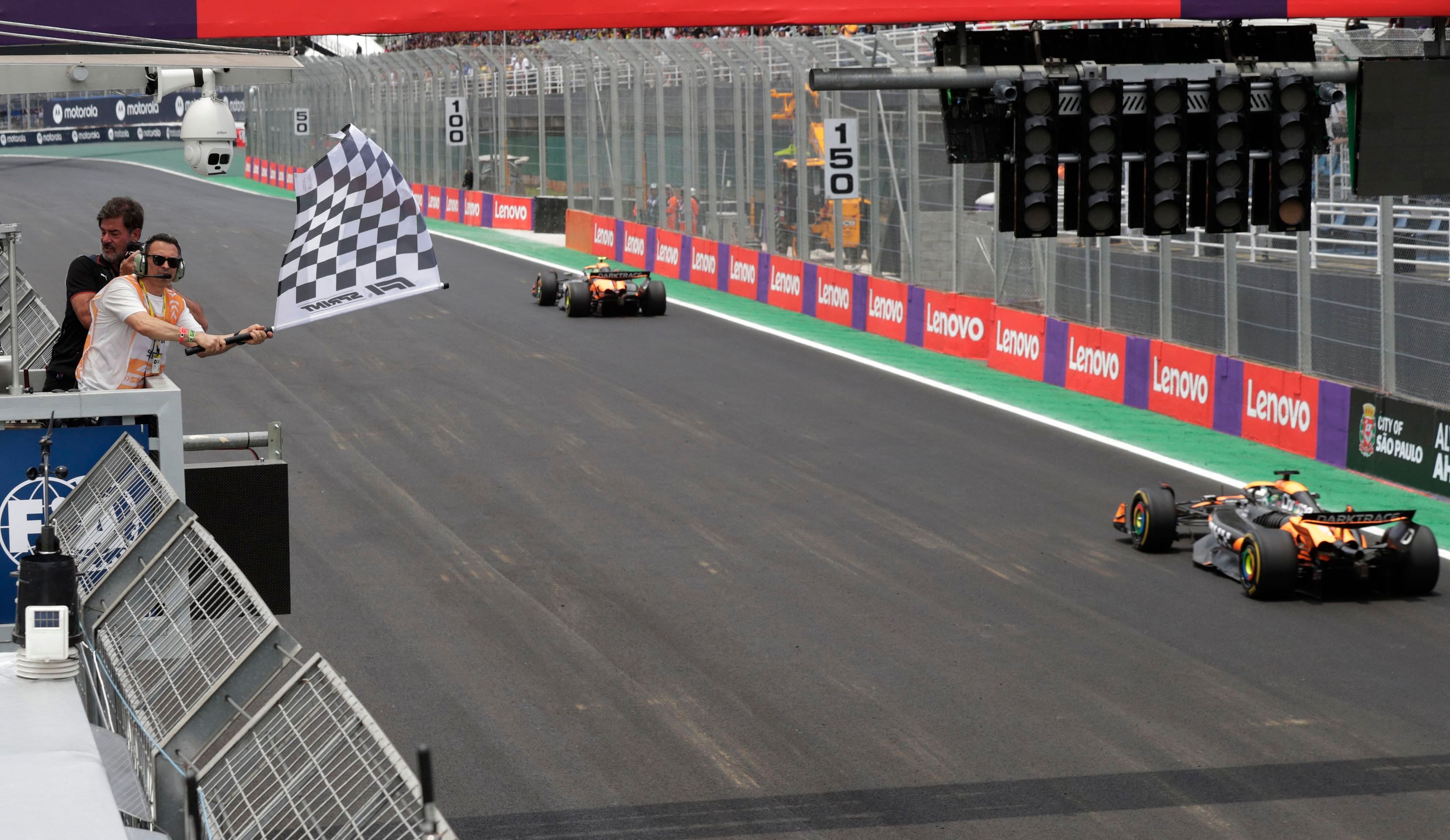 <div class="paragraphs"><p>McLaren's Lando Norris crosses the line to win the sprint race.</p><p></p></div>