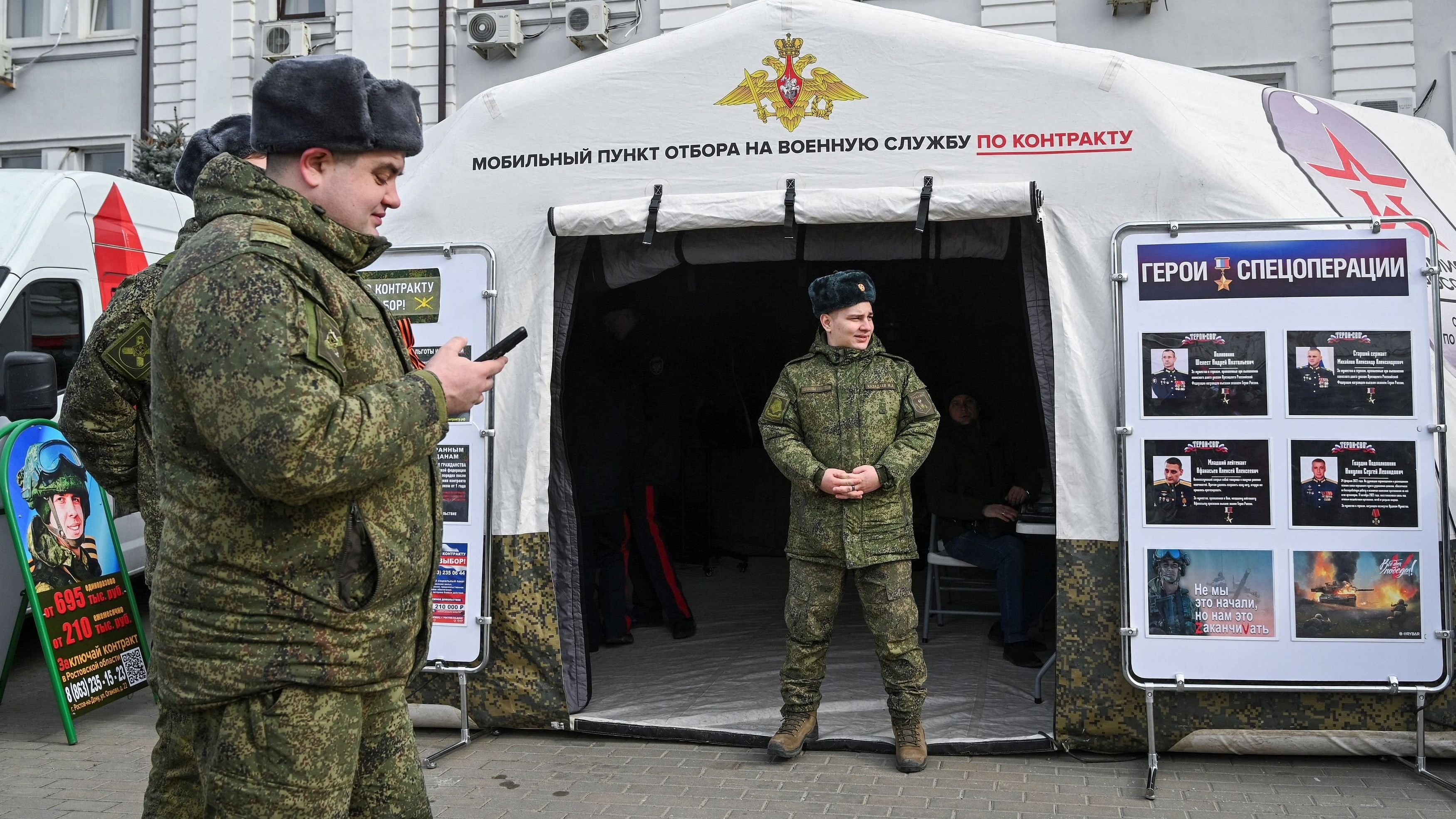 <div class="paragraphs"><p>Russian Army servicemen stand near a mobile recruiting center, during an exhibition of military hardware used in the course of the Russia-Ukraine conflict, as it arrived on a train promoting the Russian army, in Rostov-on-Don, Russia March 3, 2024. </p></div>