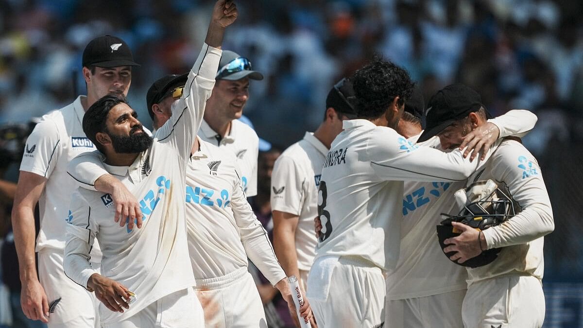 <div class="paragraphs"><p>New Zealand players celebrate their win in the third Test cricket match against India at Wankhede Stadium.</p></div>