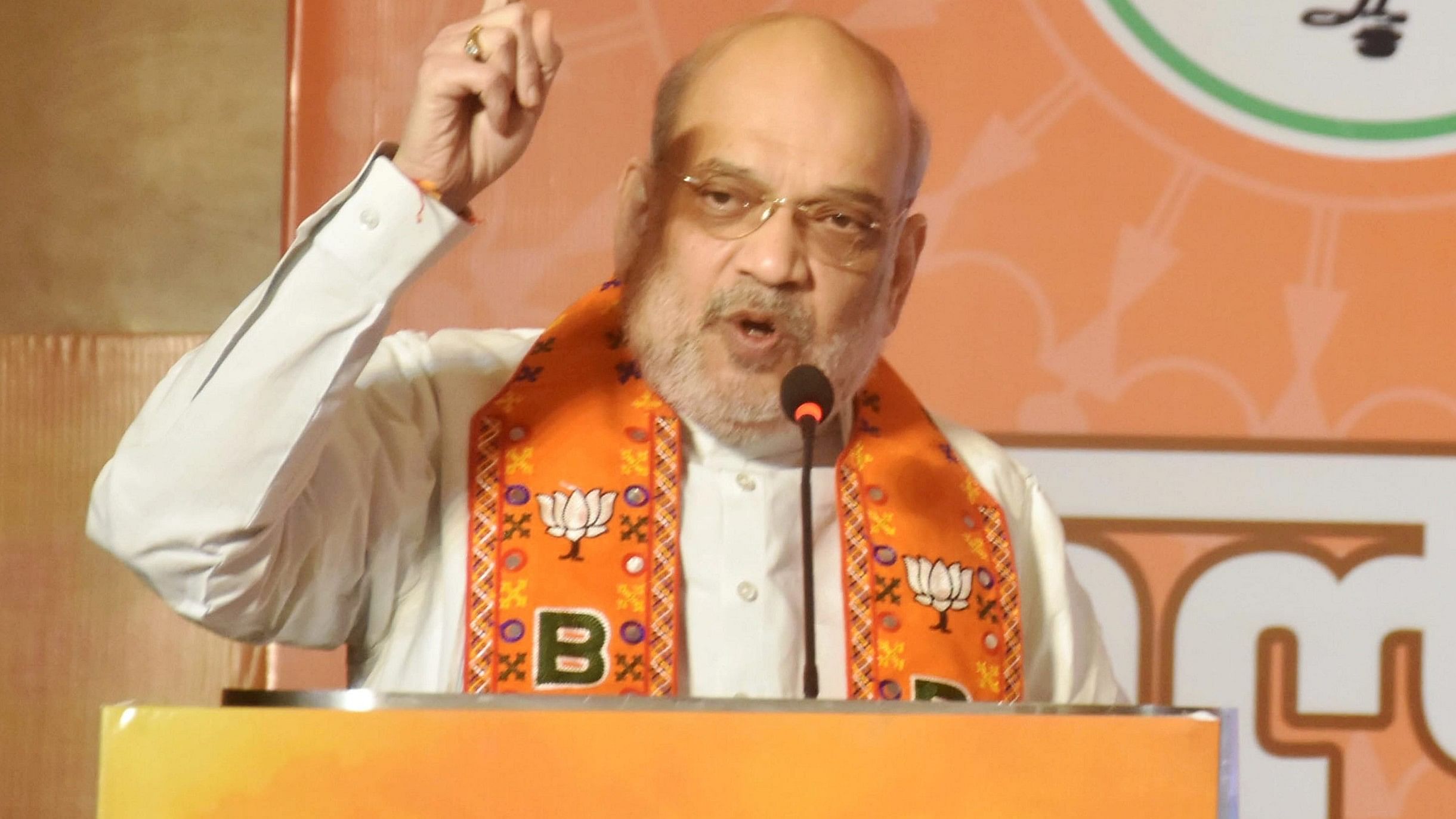 <div class="paragraphs"><p>Ranchi: Union Minister and senior BJP leader Amit Shah speaks at the release of the party's Sankalp Patra (election manifesto) for the upcoming Assembly elections, in Ranchi, Sunday, Nov. 3, 2024. </p></div>