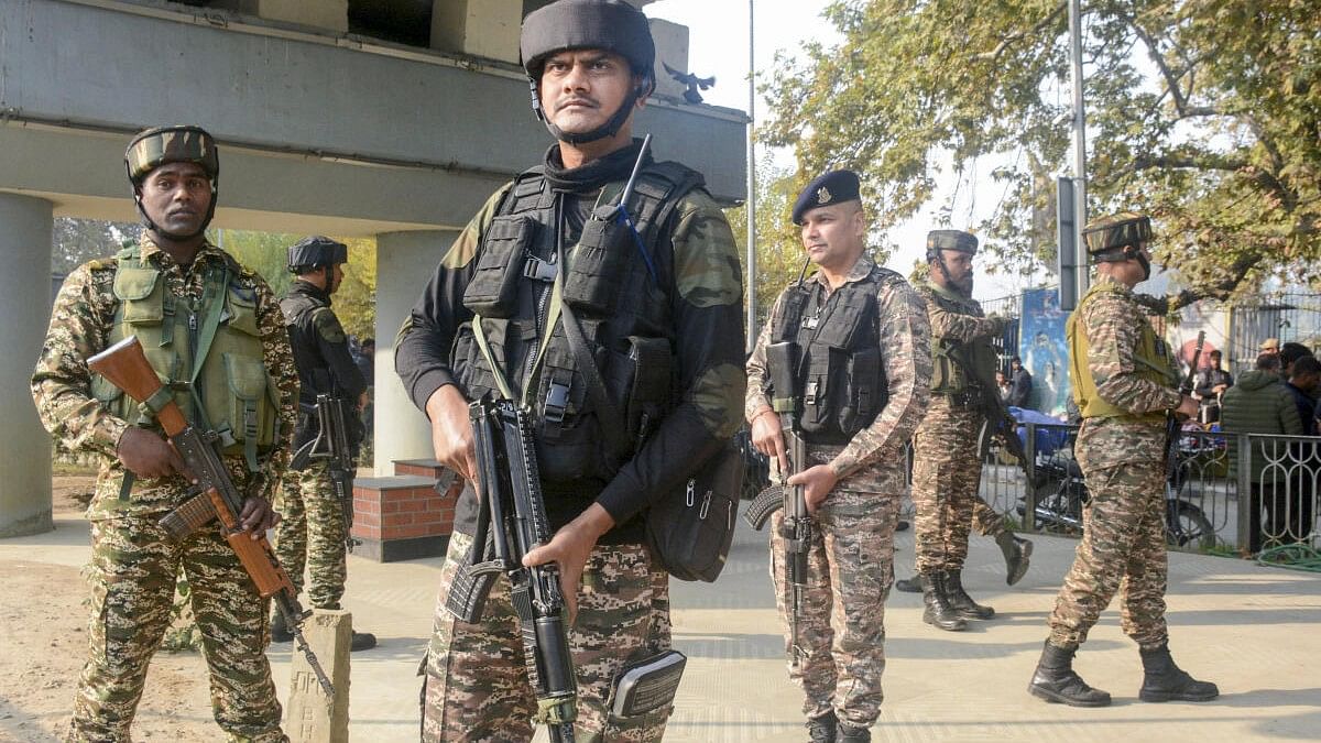 <div class="paragraphs"><p>Security personnel cordon off the area after a grenade attack by terrorists, in Srinagar.</p></div>