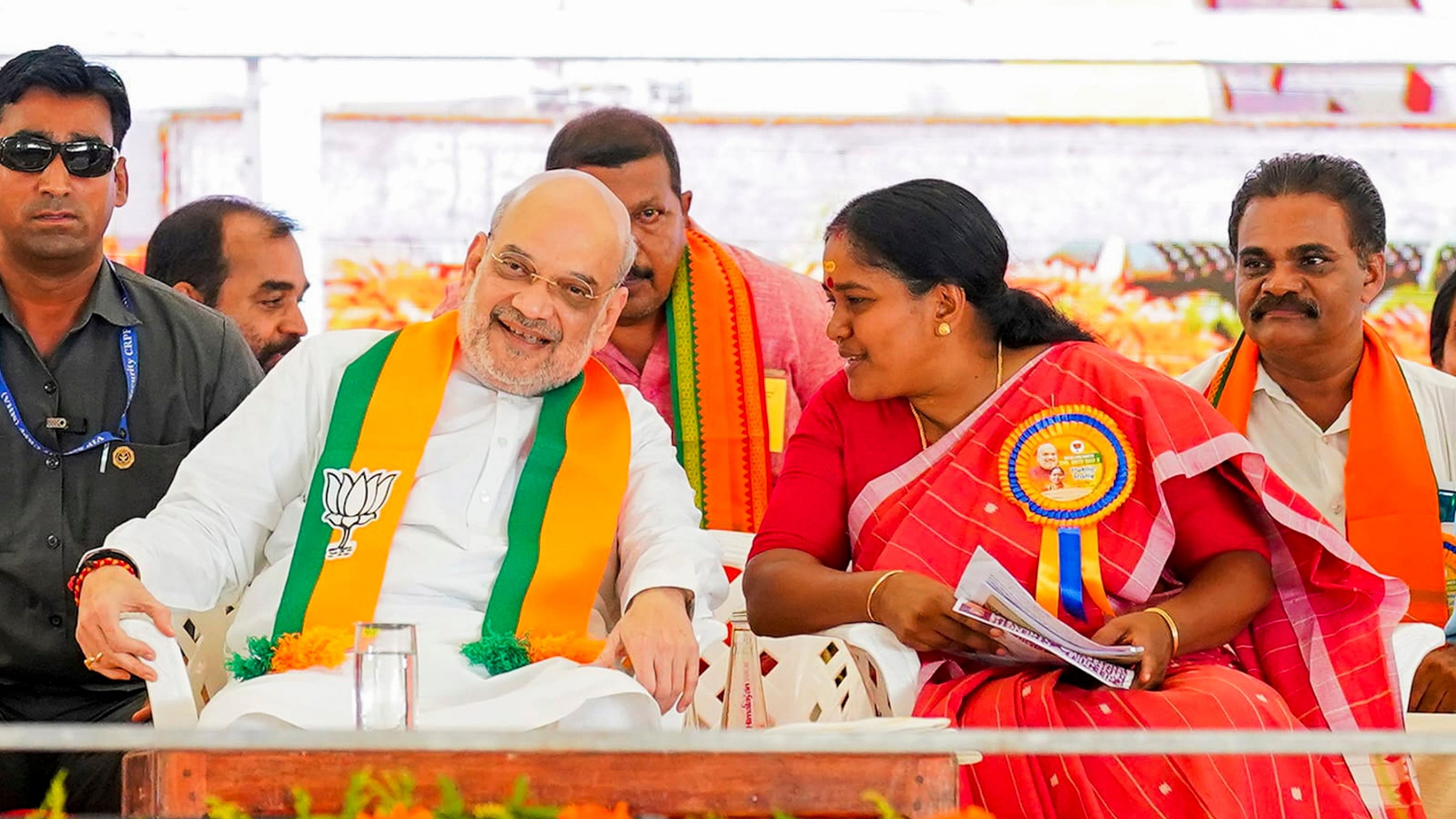 <div class="paragraphs"><p>File photo of Union Home Minister Amit Shah with BJP's Sobha Surendran  in Alappuzha.&nbsp;</p></div>