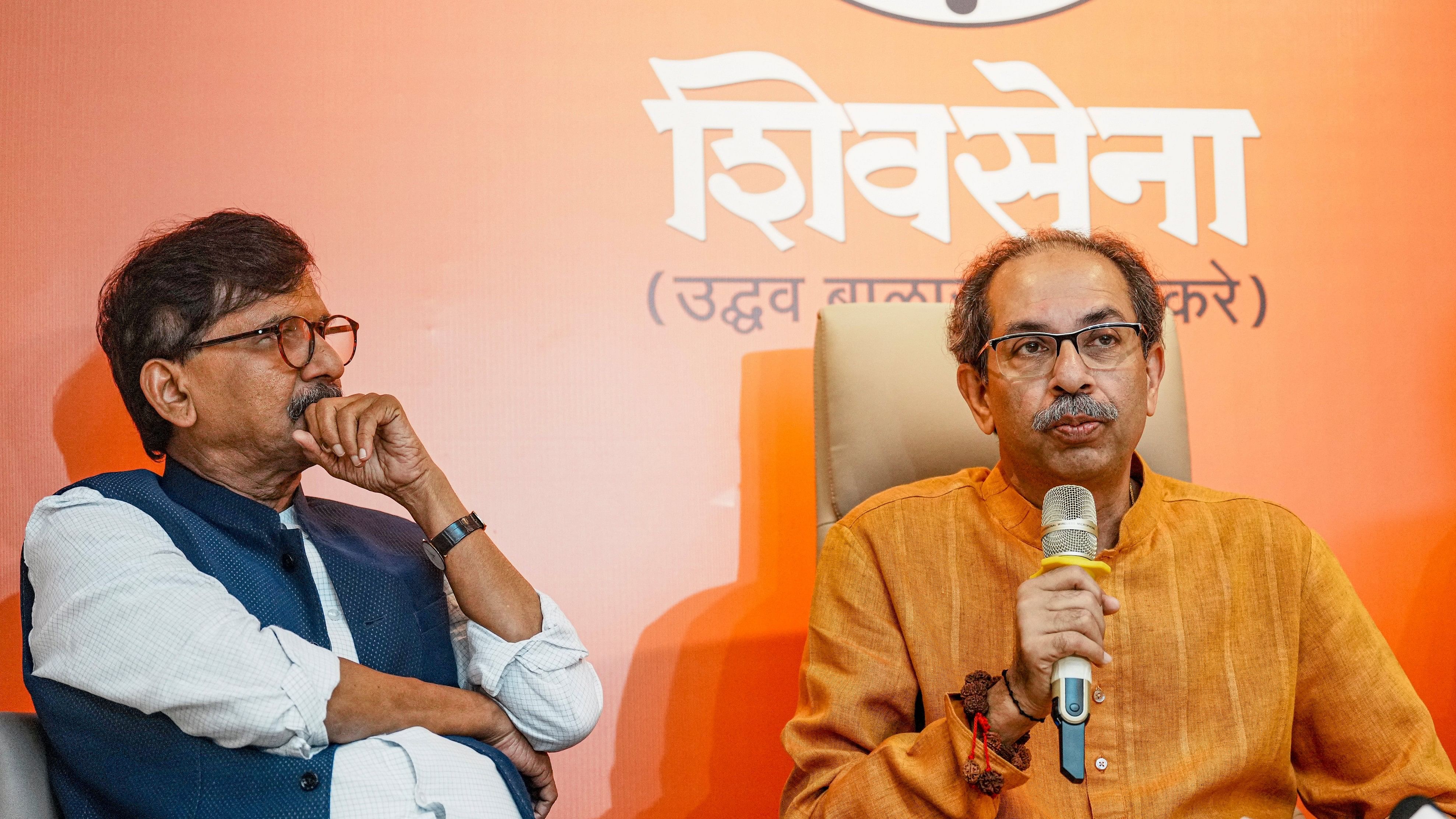 <div class="paragraphs"><p>Shiv Sena UBT chief Uddhav Thackeray with Sanjay Raut addresses a press conference at Sena Bhavan, in Mumbai.</p></div>