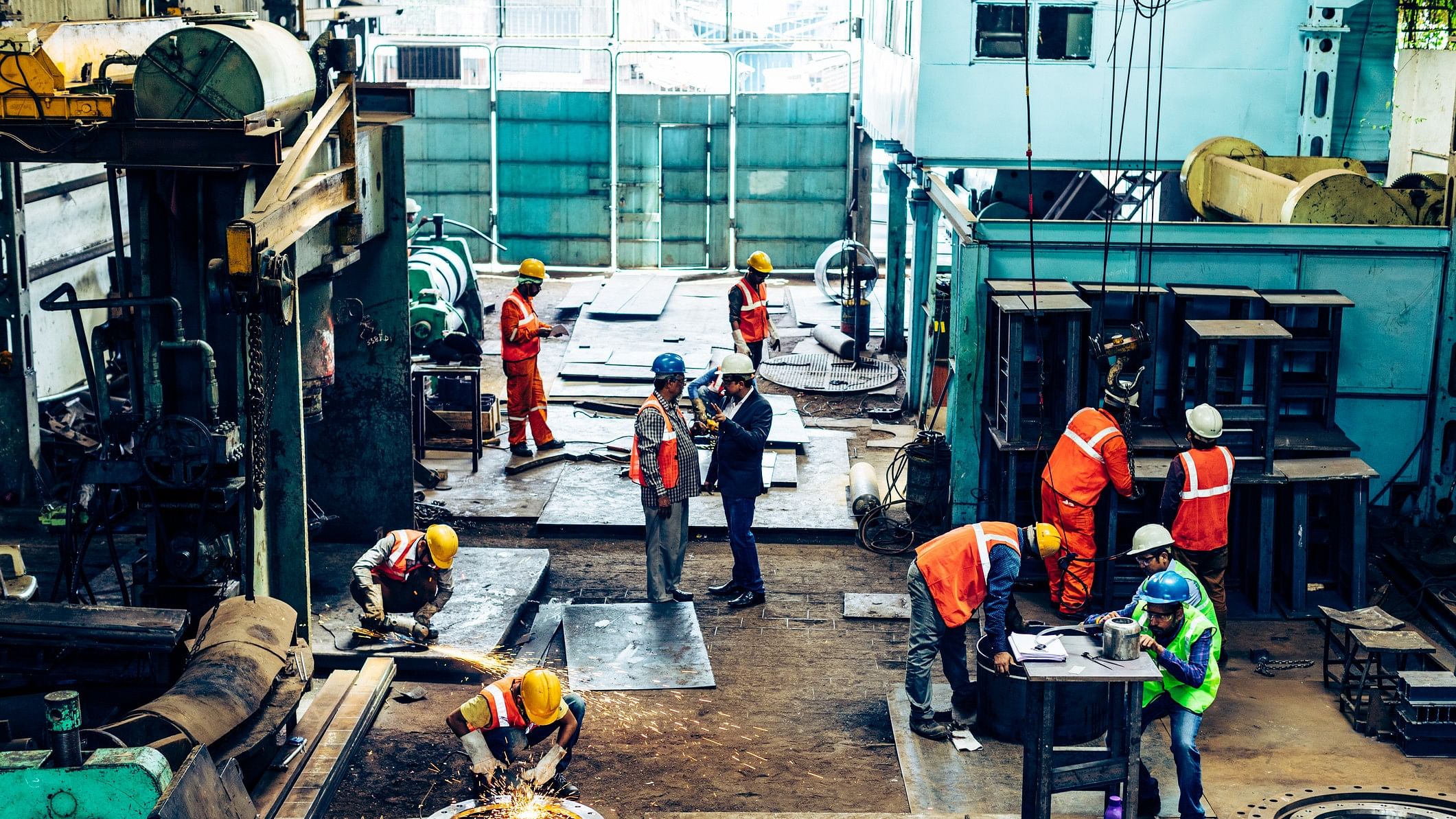 <div class="paragraphs"><p>Workers at an industrial unit. (Representative image)</p></div>