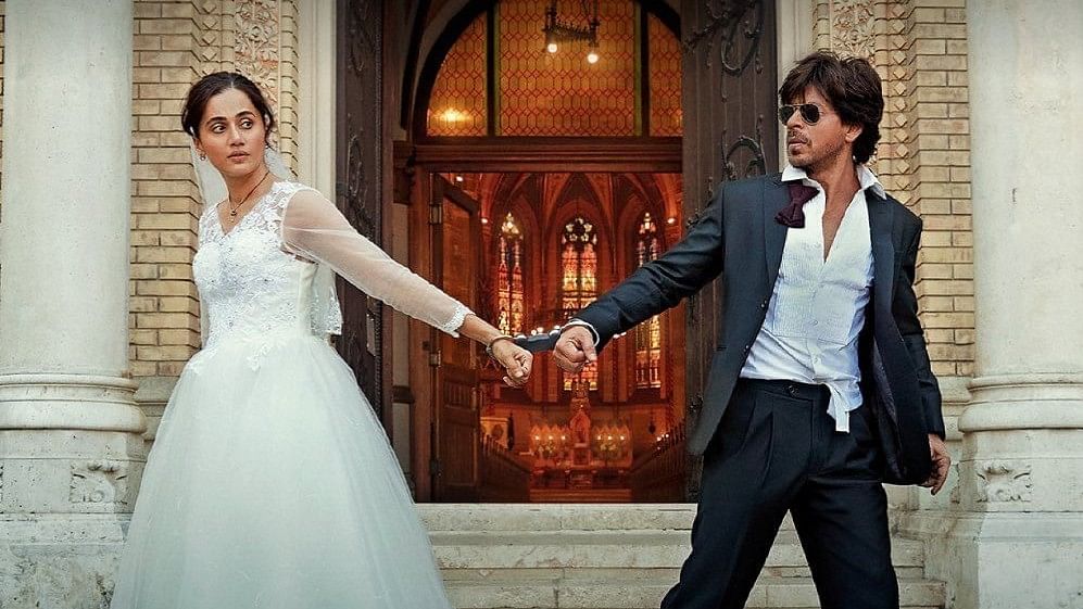 <div class="paragraphs"><p>Taapsee Pannu and Shah Rukh Khan in a still from the movie <em>Dunki</em>.</p></div>