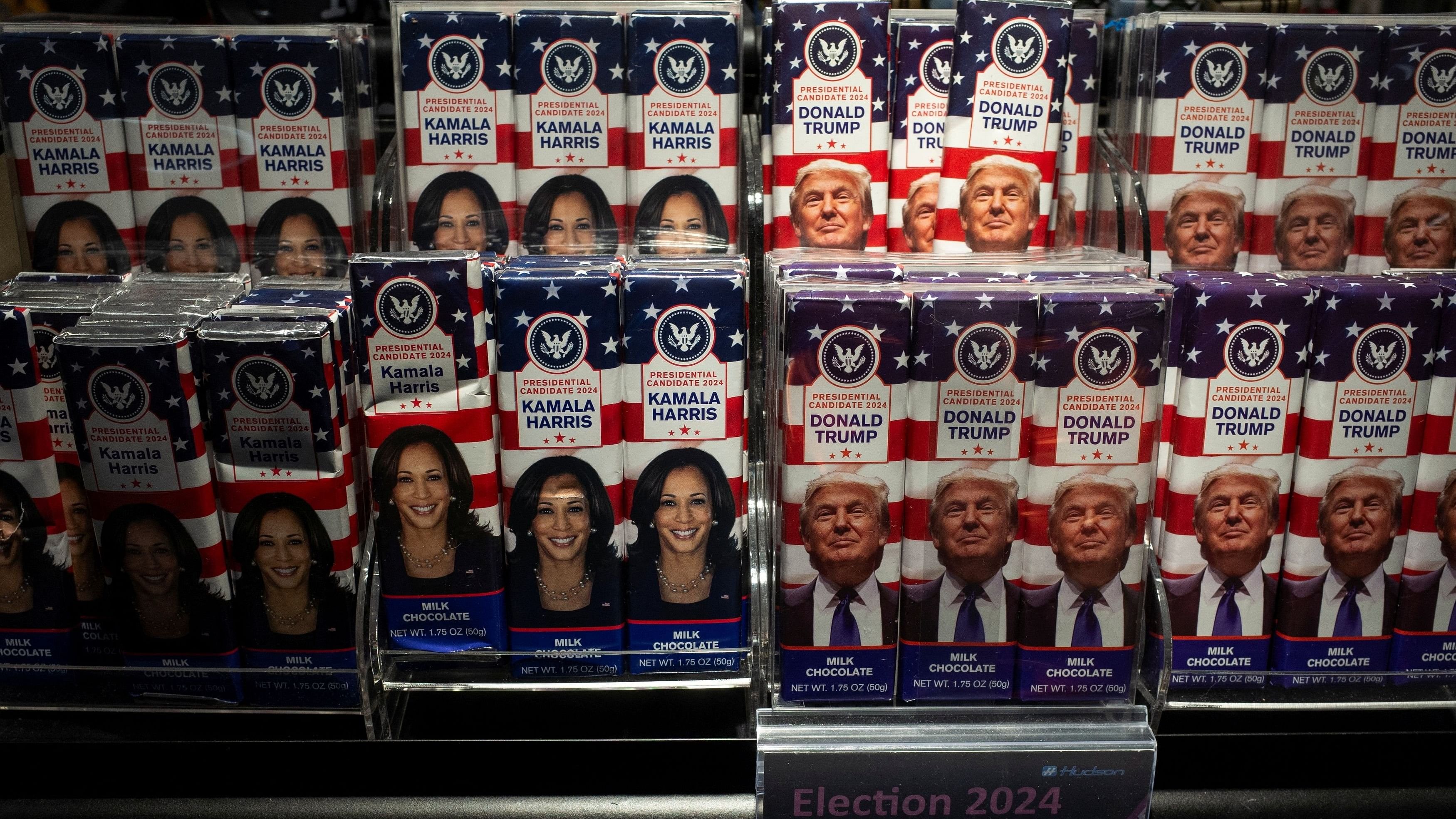 <div class="paragraphs"><p>Chocolate bars with the faces of Democratic presidential nominee US Vice President Kamala Harris and Republican presidential nominee and former US President Donald Trump are displayed at a store in John F. Kennedy International Airport, New York, US.</p></div>