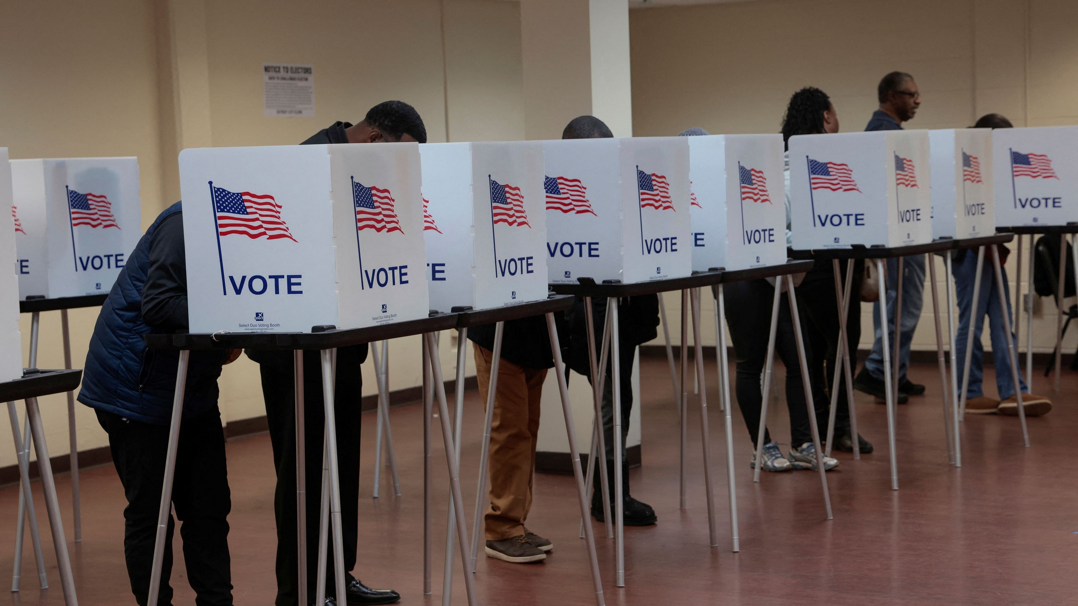 <div class="paragraphs"><p>Voters cast their votes during early voting in the US presidential election at a polling station in Detroit, Michigan, November 3, 2024.</p></div>