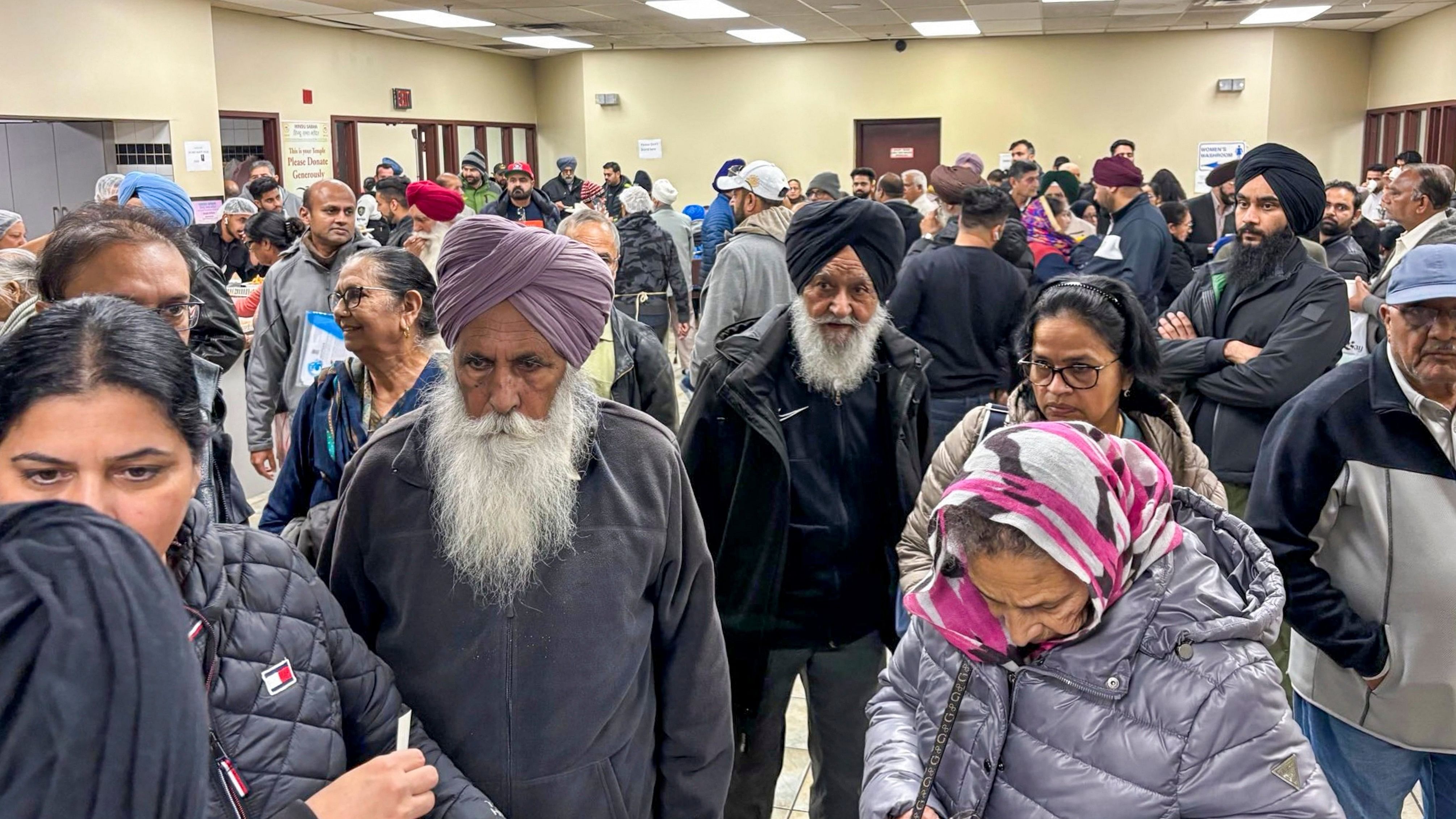 <div class="paragraphs"><p>Indians at a consular camp in Brampton, Ontario, Sunday, Nov. 3, 2024. The consular camp witnessed violent disruptions on Sunday as per Indian High Commission in Canada.  </p></div>