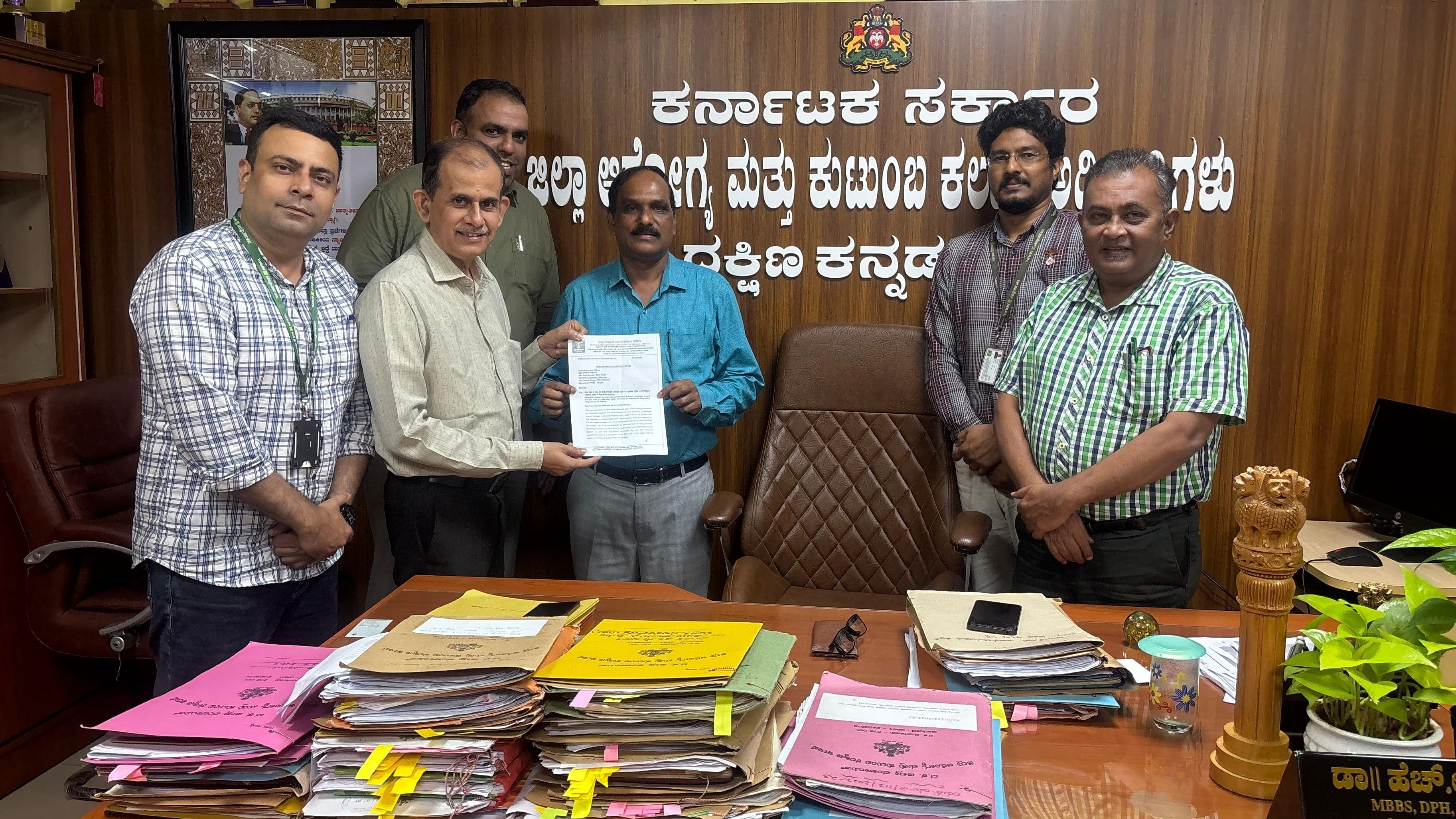 <div class="paragraphs"><p>MRPL General manager (CSR) Prashanth Baliga hands over letter of intent to DHO Dr H R Thimmaiah on its contribution of Rs 1 crore to procure CB-NAAT machine. </p></div>