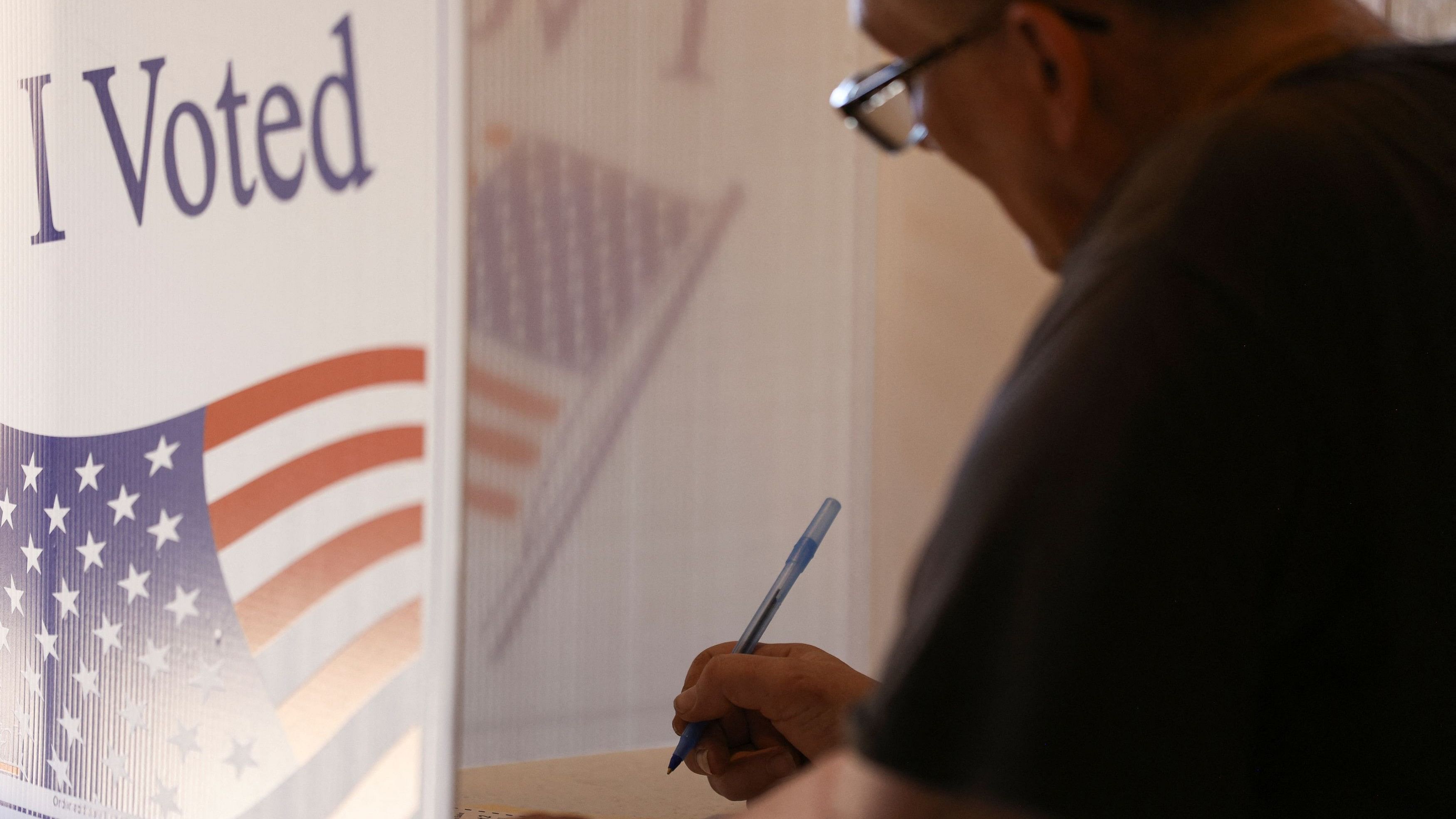 <div class="paragraphs"><p>A man votes in the 2024 US presidential election on Election Day, at the Mattress Factory in Pittsburgh, Pennsylvania</p></div>