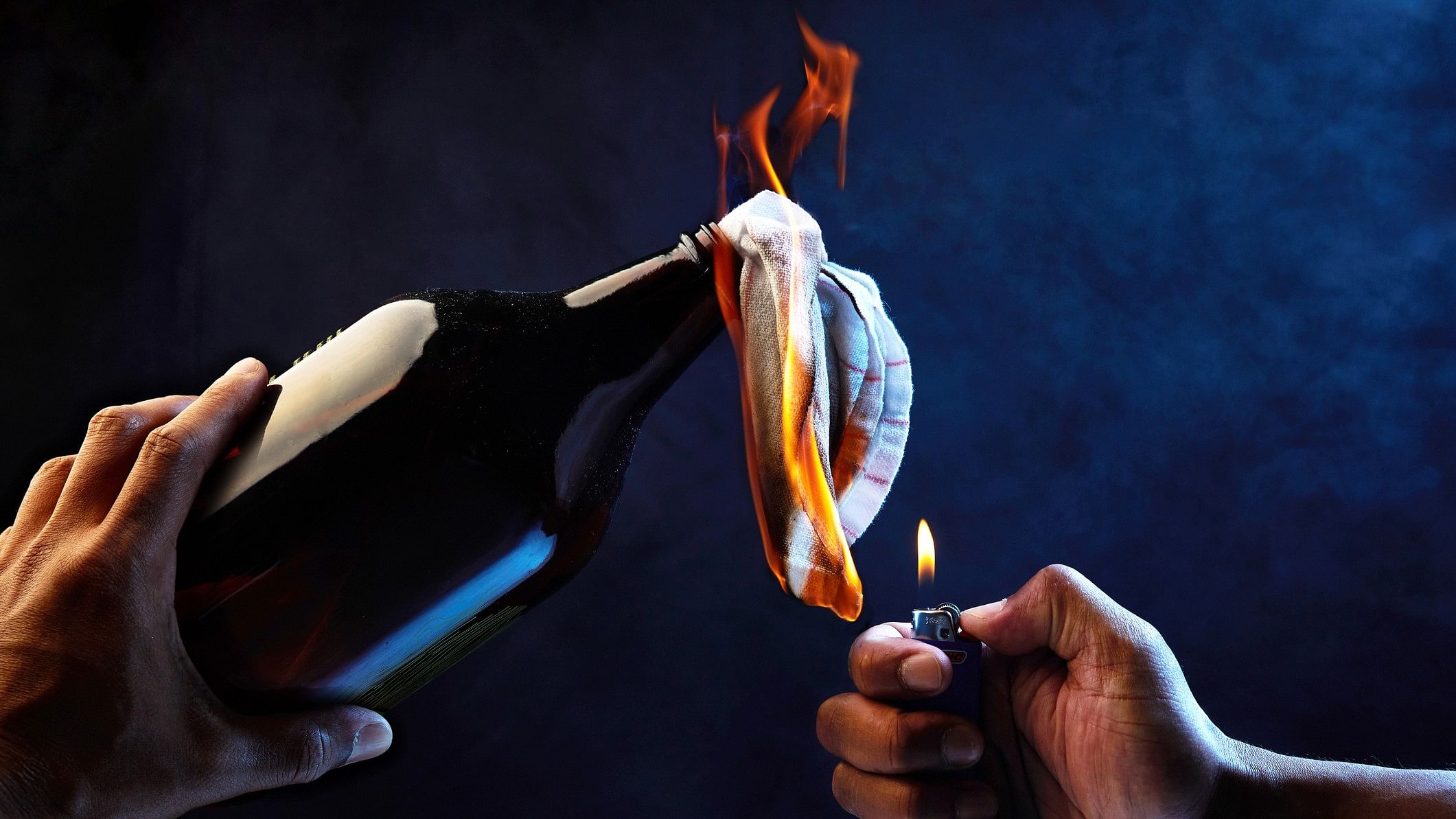 <div class="paragraphs"><p>A person lighting a petrol bomb. Image for representation.</p></div>