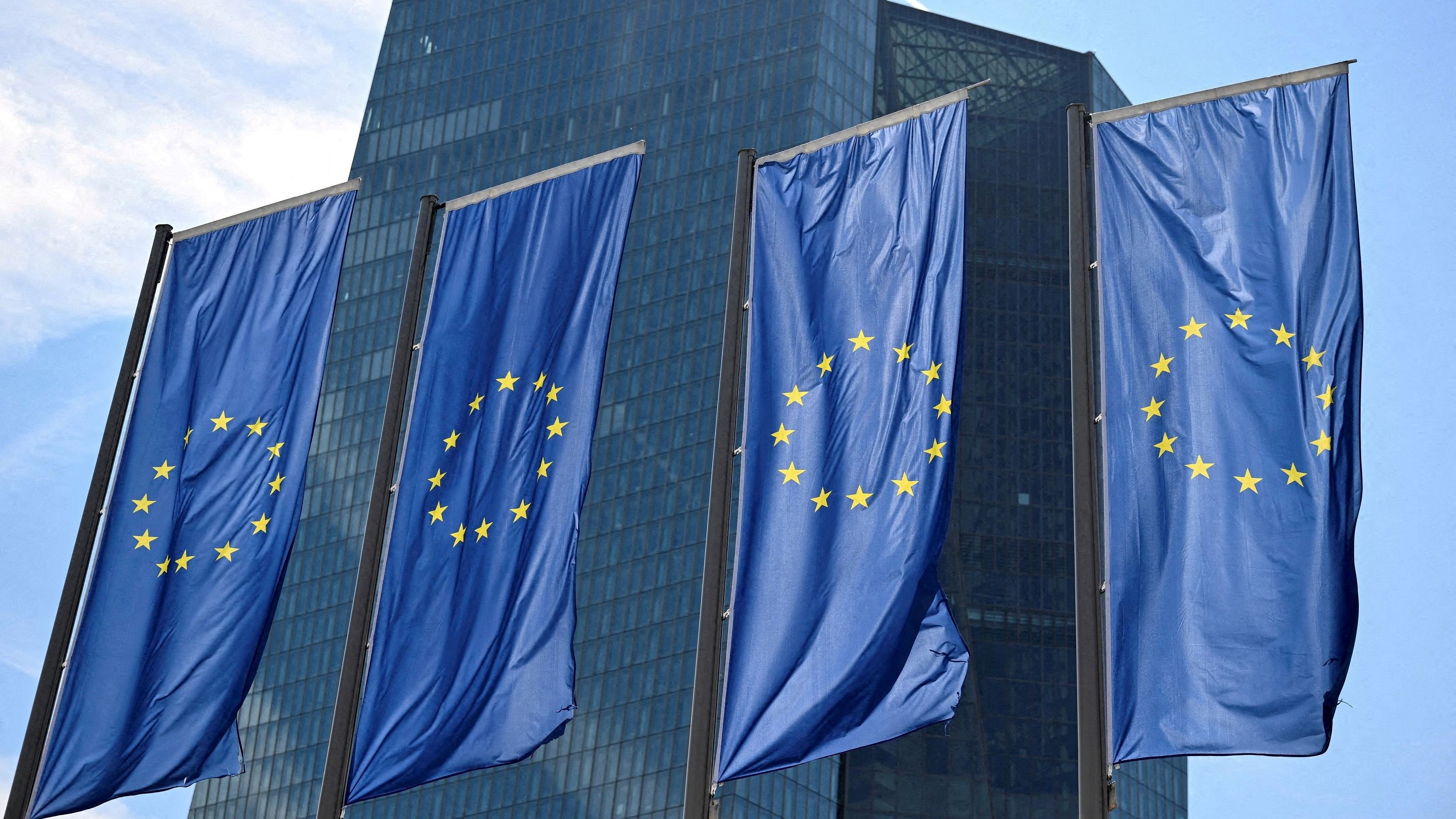 <div class="paragraphs"><p>EU flags flutter in front of European Central Bank  headquarters in Frankfurt, Germany </p></div>