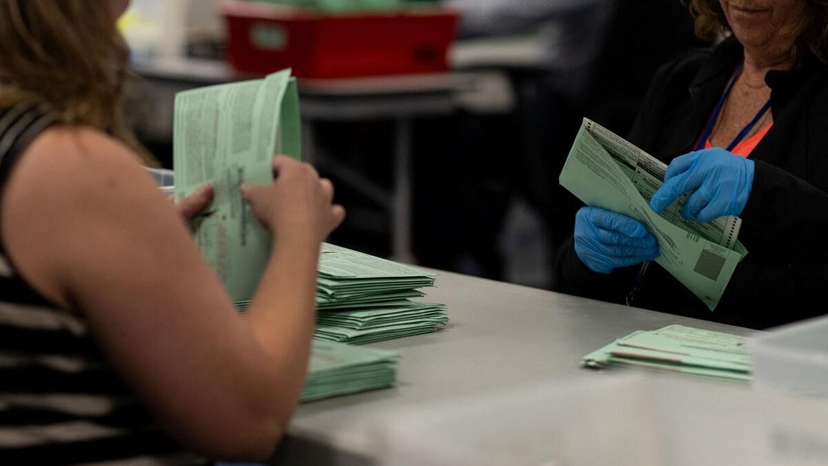 <div class="paragraphs"><p>Election workers process ballots for the 2024 U.S. presidential election on Election Day at the Maricopa County Tabulation and Election Center in Phoenix, Arizona, U.S., November 5, 2024. Image for representation.</p></div>