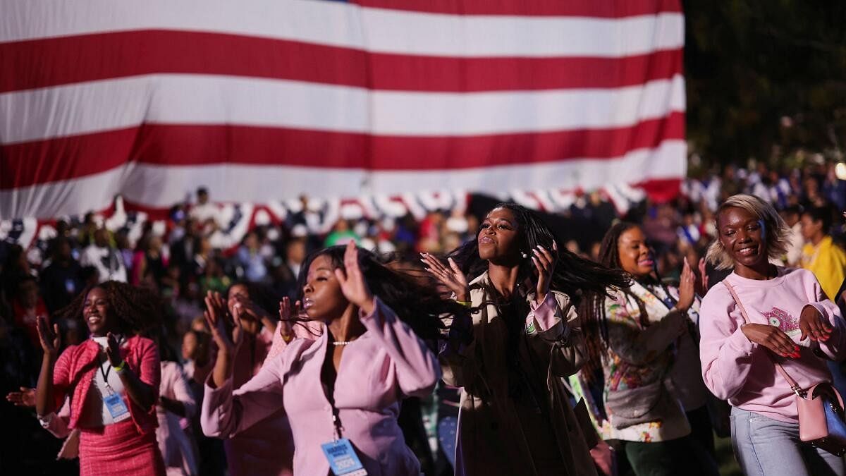 <div class="paragraphs"><p>Women dance ahead of Democratic presidential nominee US Vice President Kamala Harris's election night rally during the 2024 US presidential election, at Howard University, in Washington.</p></div>