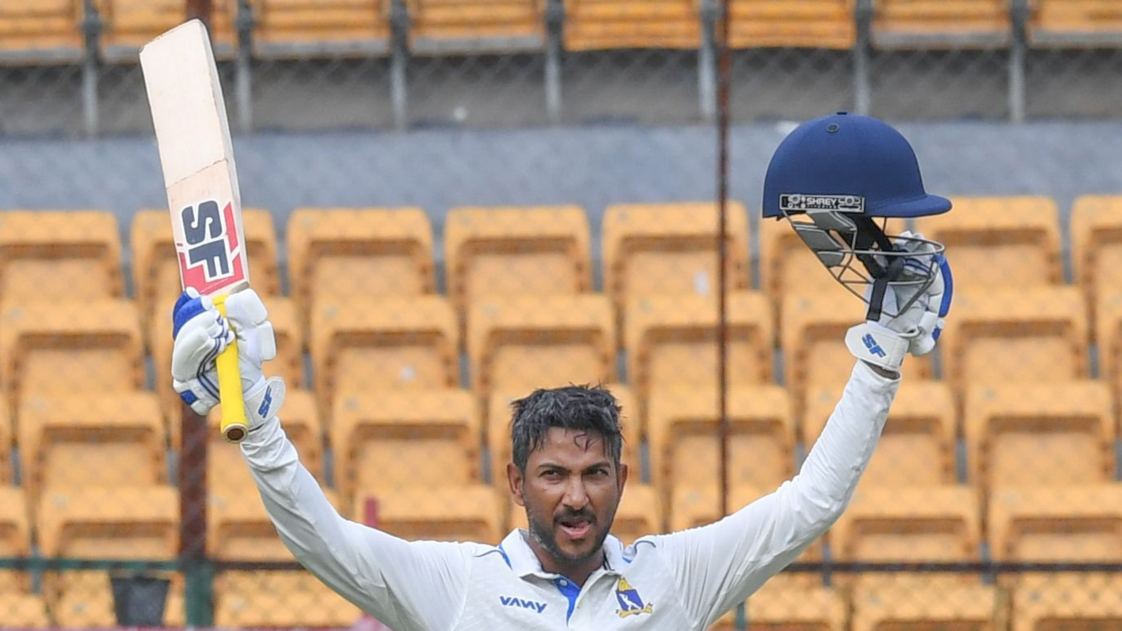 <div class="paragraphs"><p>Bengal's Anustup Majumdar celebrates after scoring a century against Karnataka on the opening day of their Group C Ranji Trophy tie&nbsp;at the M Chinnaswamy stadium in Bengaluru on Wednesday. </p></div>