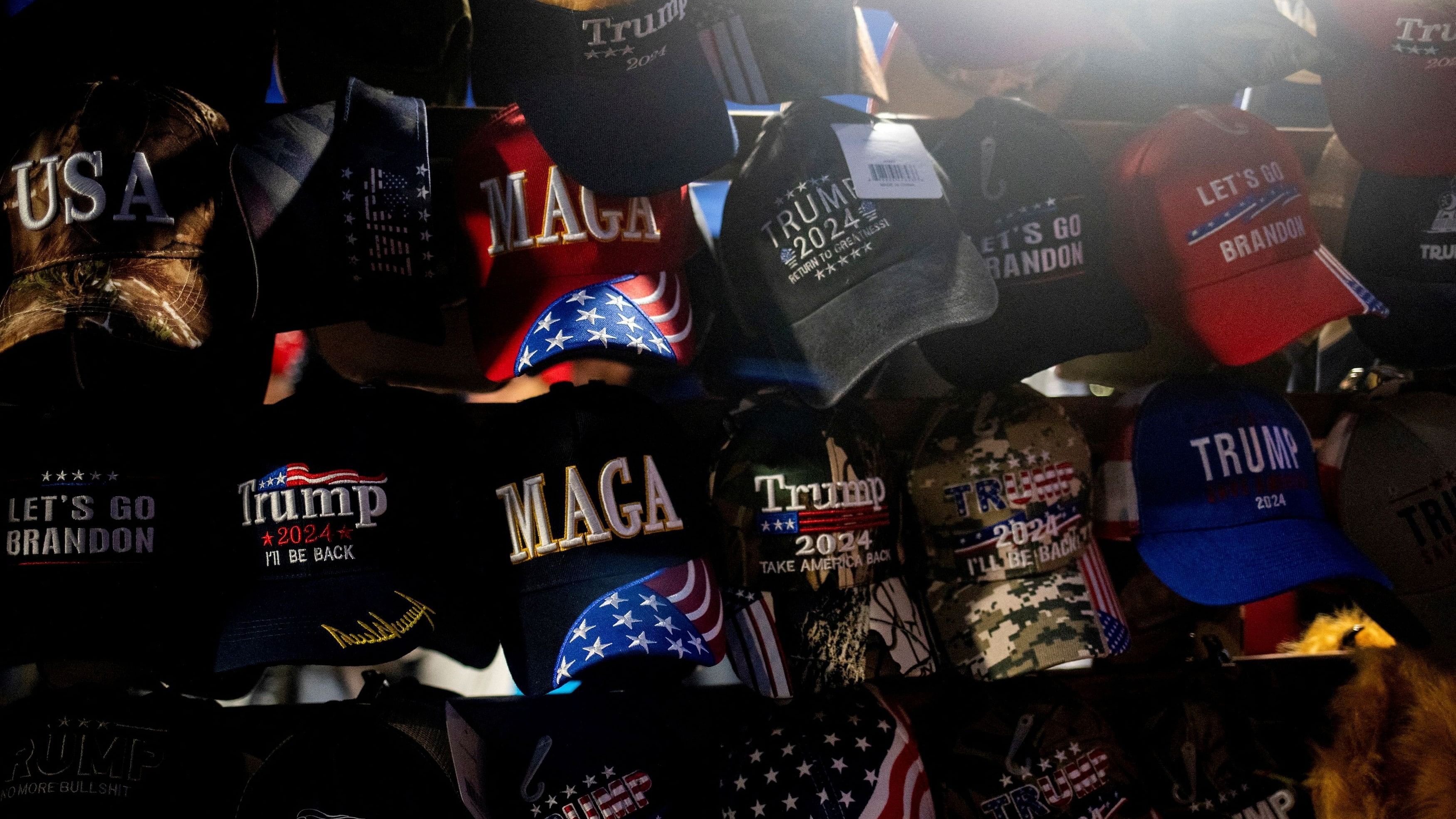 <div class="paragraphs"><p>FILE PHOTO: Merchandise for sale are displayed outside the venue where Republican presidential nominee and former U.S. President Donald Trump is expected to hold a campaign rally in Grand Rapids, Michigan, U.S., November 4, 2024. </p></div>