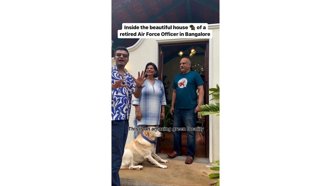 <div class="paragraphs"><p>Screengrab from an Instagram reel&nbsp;featuring the house of a retired Air Force officer in the city. Priyam Saraswat (left) with the homeowners.</p></div>