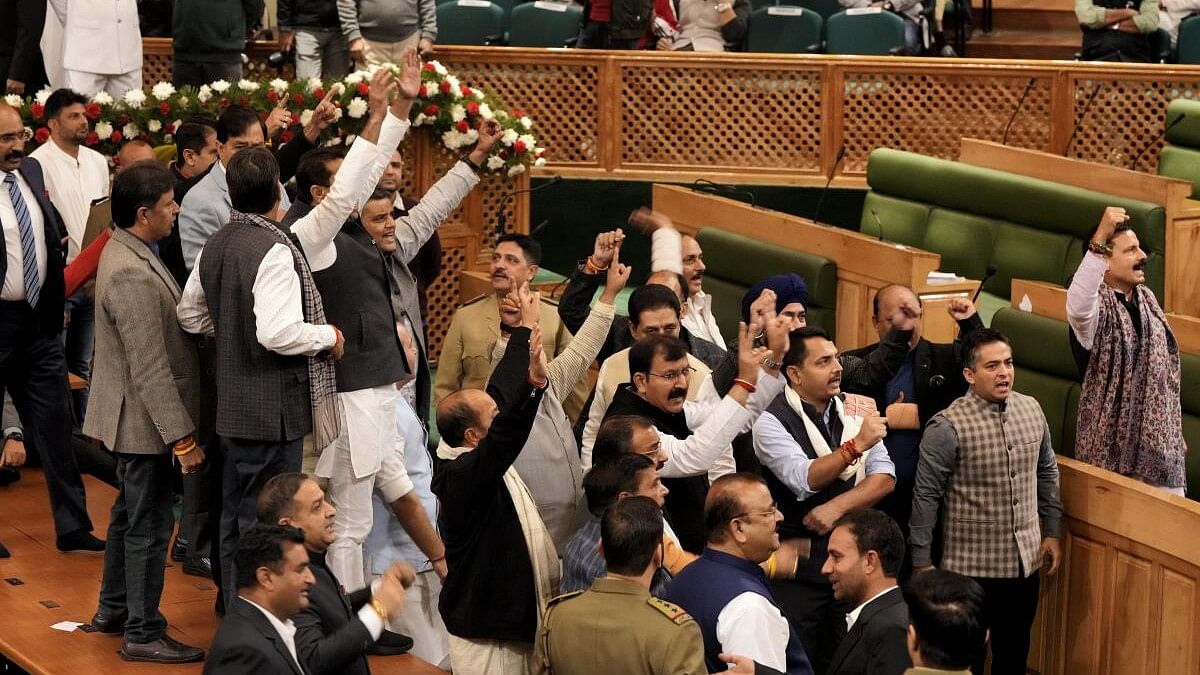 <div class="paragraphs"><p>BJP legislators hold a protest after the Assembly passed a resolution on Article 370 restoration by voice vote, in Srinagar, Wednesday, Nov. 6, 2024.</p></div>