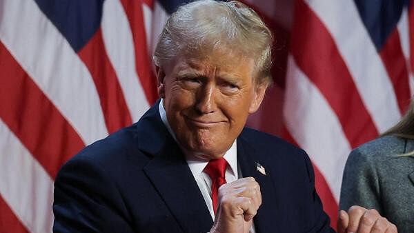 <div class="paragraphs"><p>Republican presidential nominee and former US President Donald Trump dances after speaking following early results from the 2024 US presidential election in Palm Beach County Convention Center, in West Palm Beach, Florida</p></div>