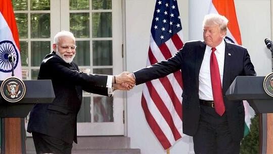 <div class="paragraphs"><p>In this June 27, 2017 file image Prime Minister Narendra Modi and the then President of United States of America (USA) Donald Trump exchange greetings</p></div>