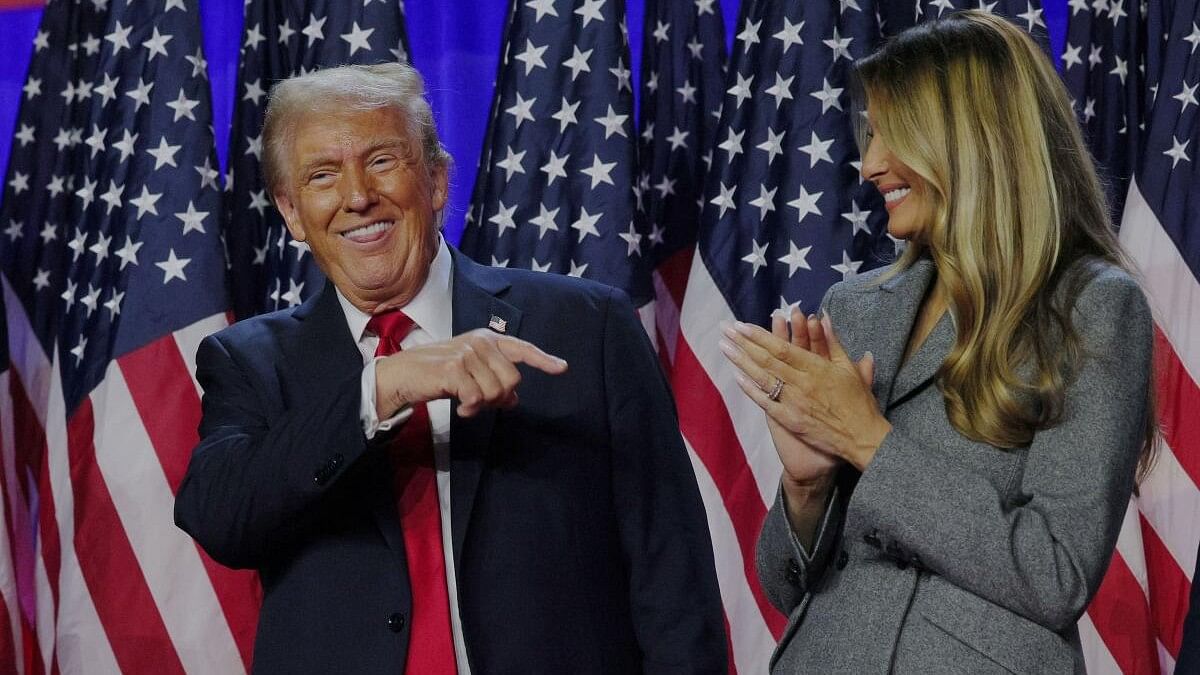 <div class="paragraphs"><p>Republican presidential nominee and former US President Donald Trump points to his wife Melania at Trump's Election rally, at the Palm Beach County Convention Center in West Palm Beach, Florida, US, November 6, 2024.</p></div>