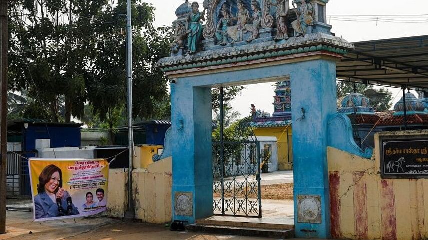 <div class="paragraphs"><p>A poster of Democratic presidential nominee US Vice President Kamala Harris hangs outside a deserted Sri Dharmasastha temple in TN's Thulasendrapuram, the village where Democratic presidential nominee  Kamala Harris' maternal grandfather was born.&nbsp;&nbsp;</p></div>