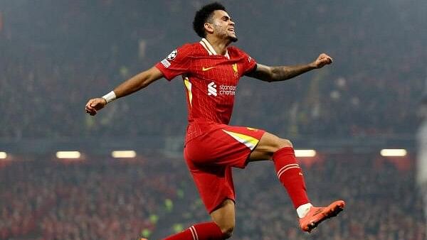 <div class="paragraphs"><p>Liverpool's Luis Diaz celebrates scoring their fourth goal and completes his hat-trick.</p></div>