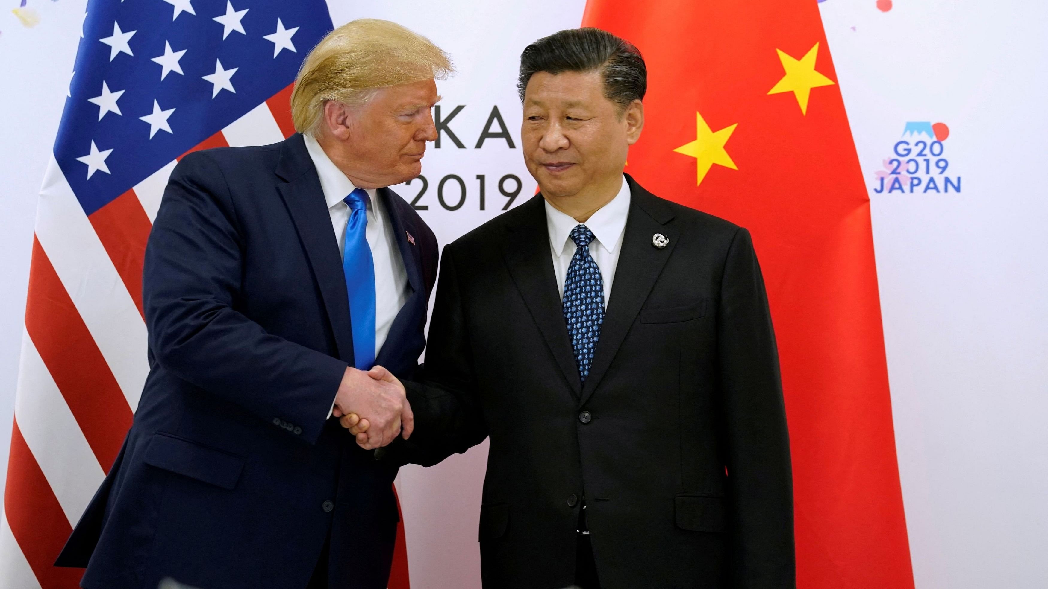 <div class="paragraphs"><p>File Photo of US President-elect Donald Trump and China's President Xi Jinping shake hands ahead of their bilateral meeting during the G20 leaders summit in Osaka, Japan, June 29, 2019. </p></div>