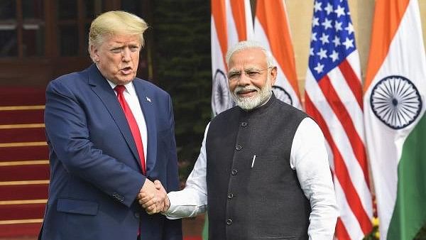 <div class="paragraphs"><p>US President-elect Donald Trump along with PM Narendra Modi.</p></div>