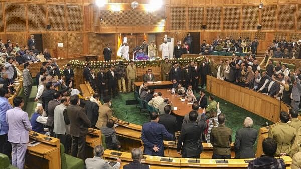 <div class="paragraphs"><p>Opposition legislators stage a protest over the Article 370 restoration resolution in the Jammu and Kashmir Assembly, in Srinagar.</p></div>