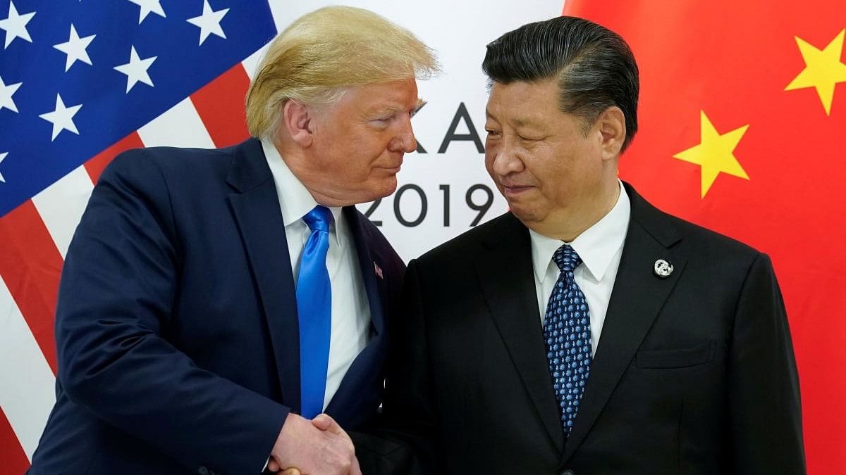 <div class="paragraphs"><p>File photo of US President-elect Donald Trump meeting with China's President Xi Jinping.</p></div>