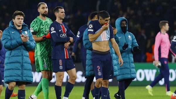 <div class="paragraphs"><p>Paris St Germain's Achraf Hakimi and teammates players look dejected after the match</p></div>