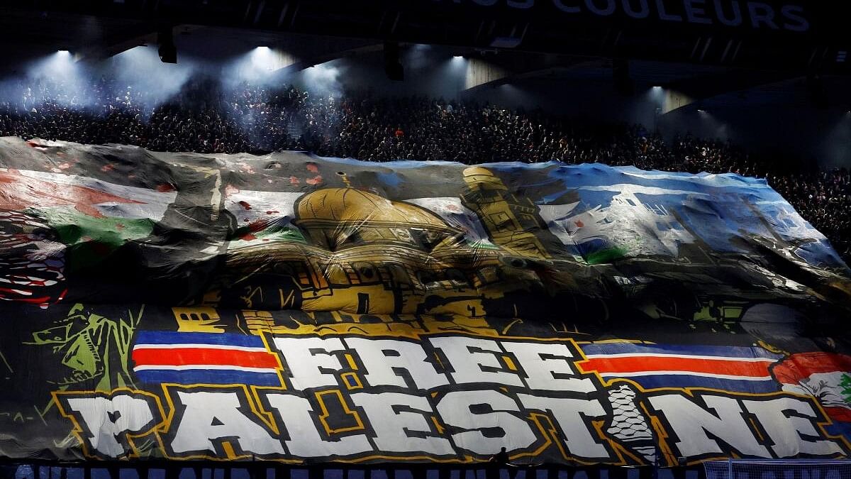 <div class="paragraphs"><p>A banner on support of Palestine is displayed in the stands before the match before the PSG  v Atletico Madrid match in France.&nbsp;</p></div>