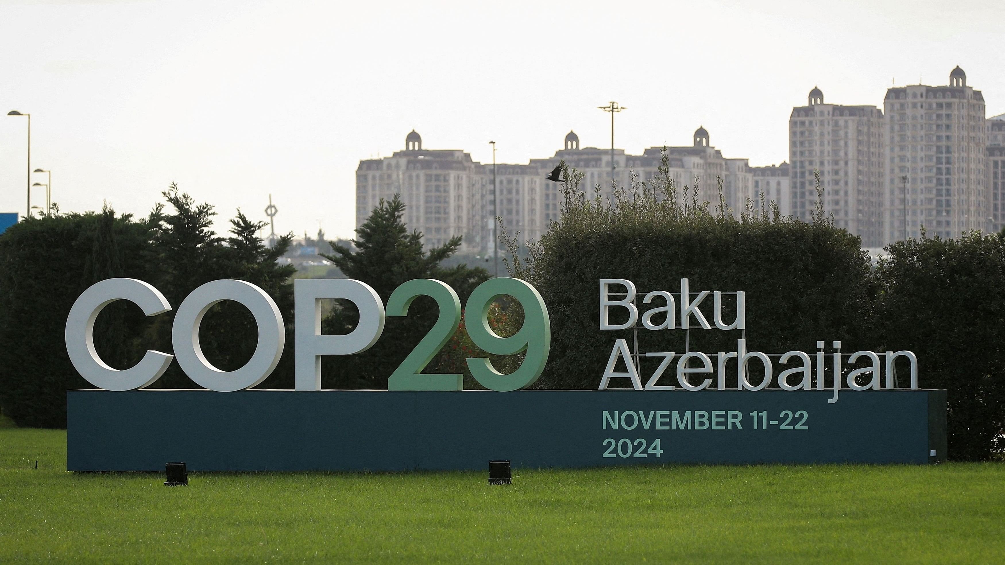 <div class="paragraphs"><p>A view shows a sign of the COP29 United Nations Climate Change Conference with a backdrop of the cityscape in Baku, Azerbaijan.</p></div>