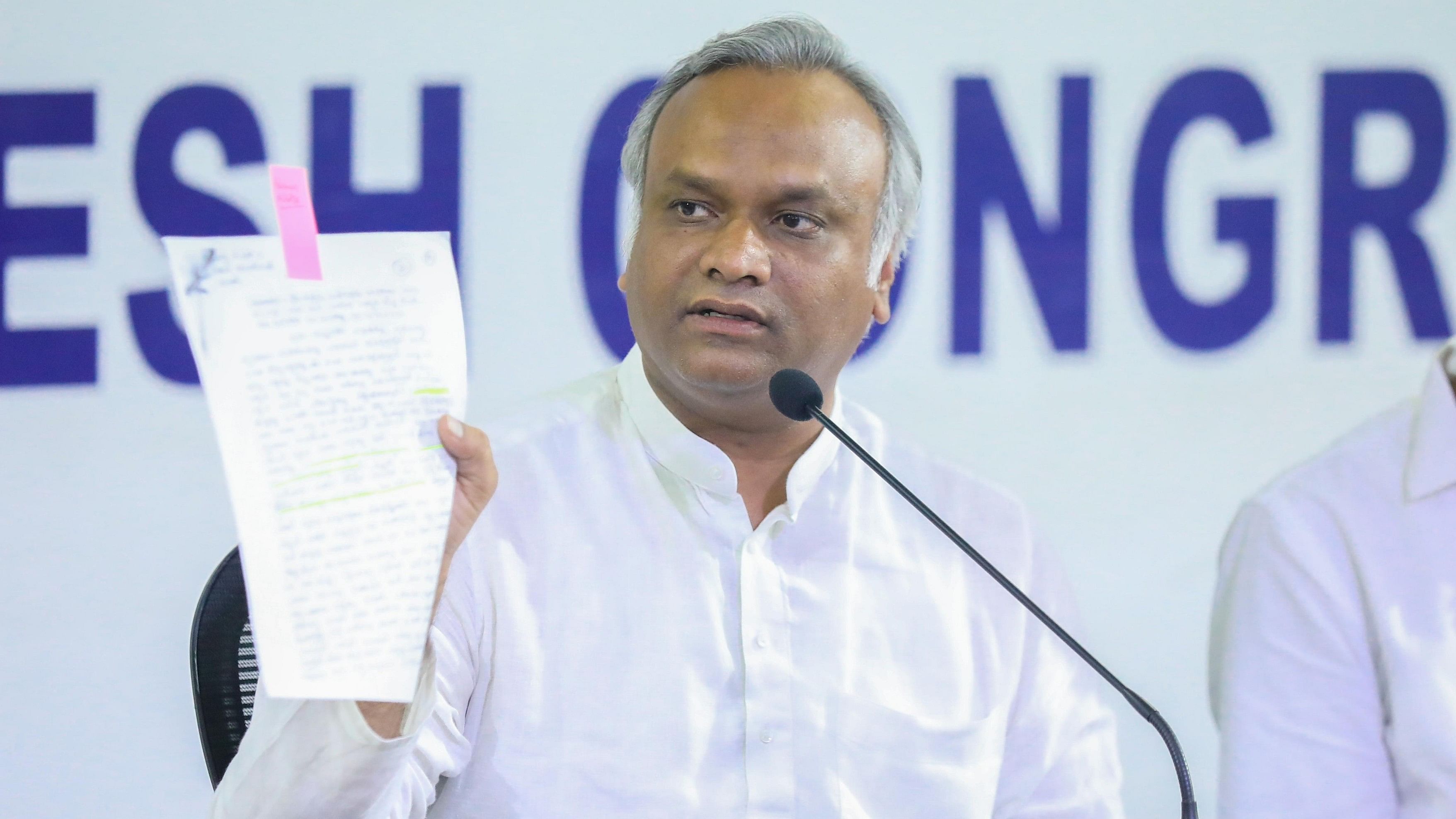 <div class="paragraphs"><p>Priyank Kharge gestures while addressing a press conference.&nbsp;</p></div>