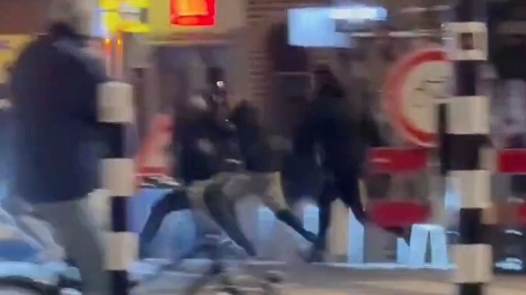 <div class="paragraphs"><p>Screengrab from a video of the assailants attacking the Israeli fans.</p></div>