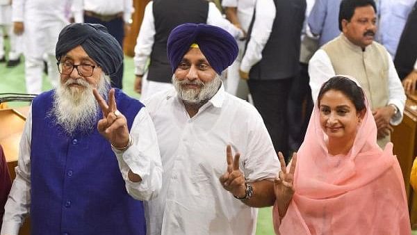 <div class="paragraphs"><p>Shiromani Akali Dal leader Parkash Singh Badal, Sukhbir Singh Badal and his wife Harsimrat Kaur Badal.</p></div>