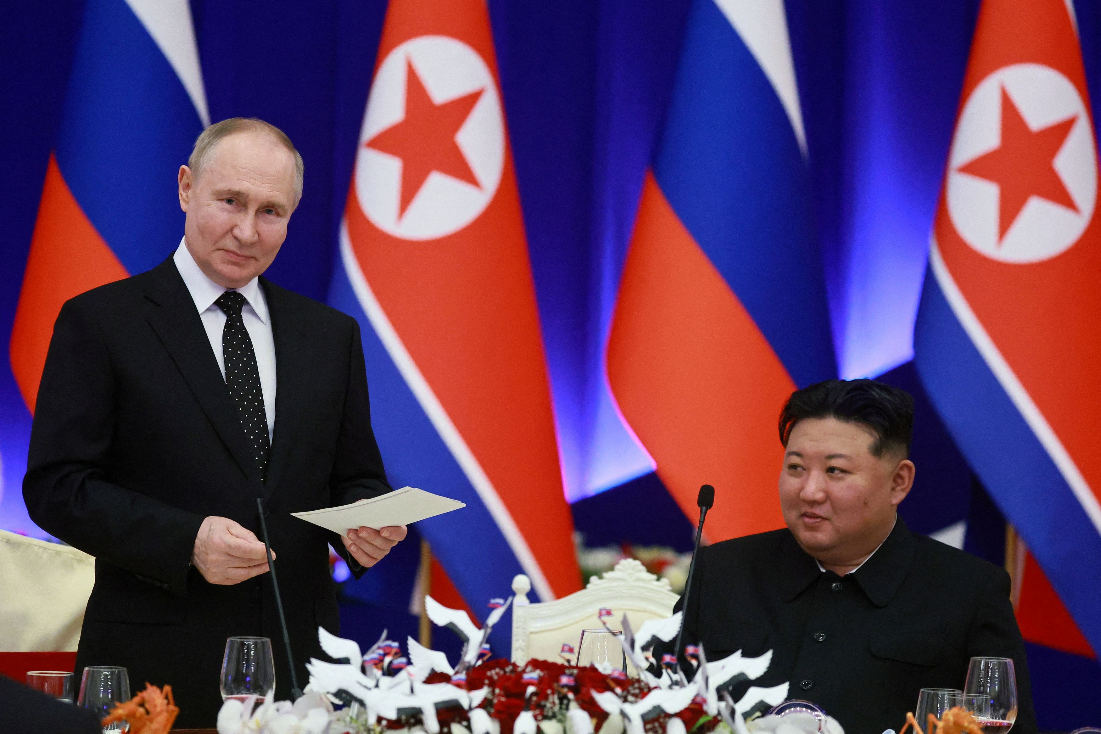 FILE PHOTO: Russia's President Vladimir Putin and North Korea's leader Kim Jong Un attend a state reception in Pyongyang, North Korea June 19, 2024. Sputnik/Vladimir Smirnov/Pool via REUTERS ATTENTION EDITORS - THIS IMAGE WAS PROVIDED BY A THIRD PARTY./File Photo