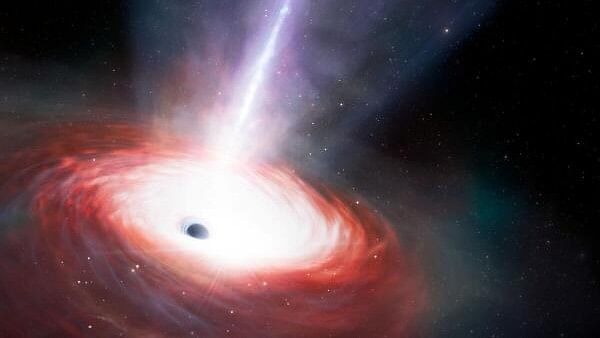 <div class="paragraphs"><p>An artist's illustration shows a rapidly feeding black hole.</p></div>