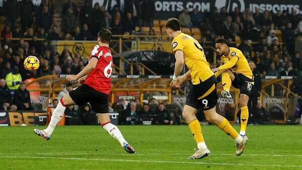 <div class="paragraphs"><p>Wolverhampton Wanderers' Matheus Cunha scores their second goal.</p></div>