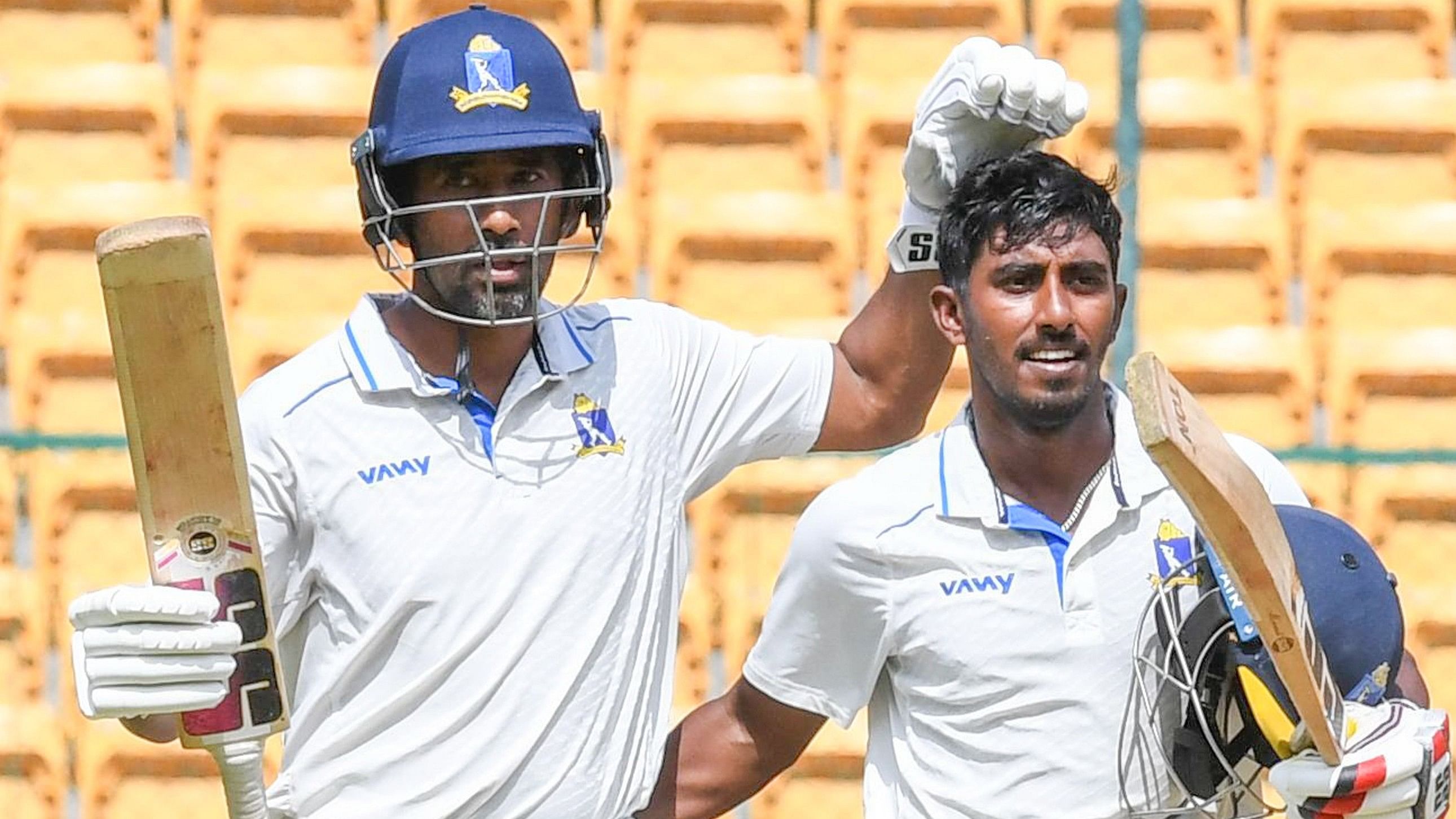 <div class="paragraphs"><p>The obduracy of Sudip Kumar Gharami (right) and the enterprise of Wriddhiman Saha helped Bengal assert their dominance on the final day of their Ranji Trophy fixture at the M Chinnaswamy stadium on Saturday. </p></div>